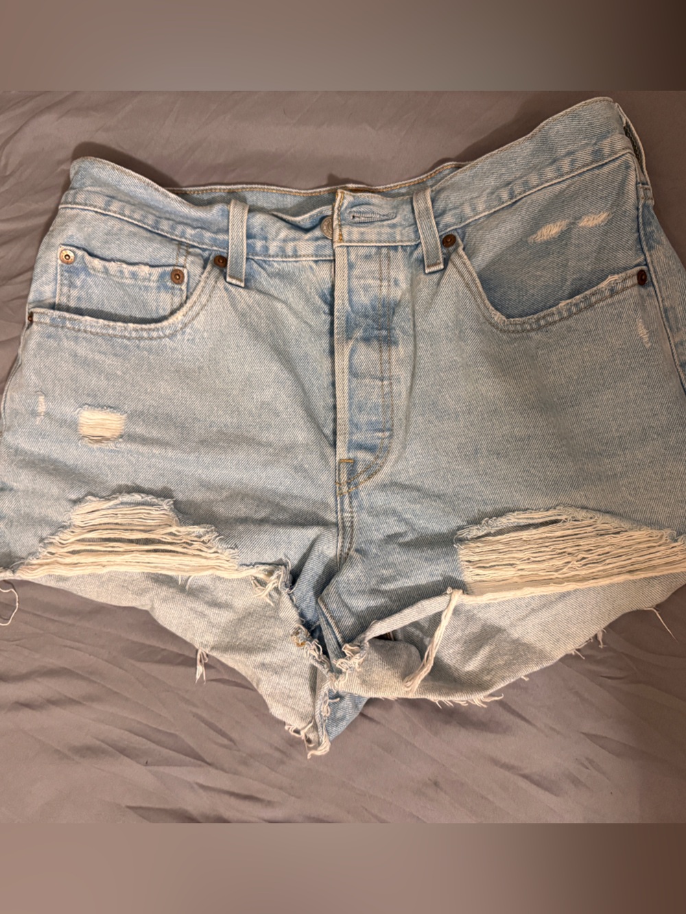 Levi’s Light Wash Distressed Denim Shorts